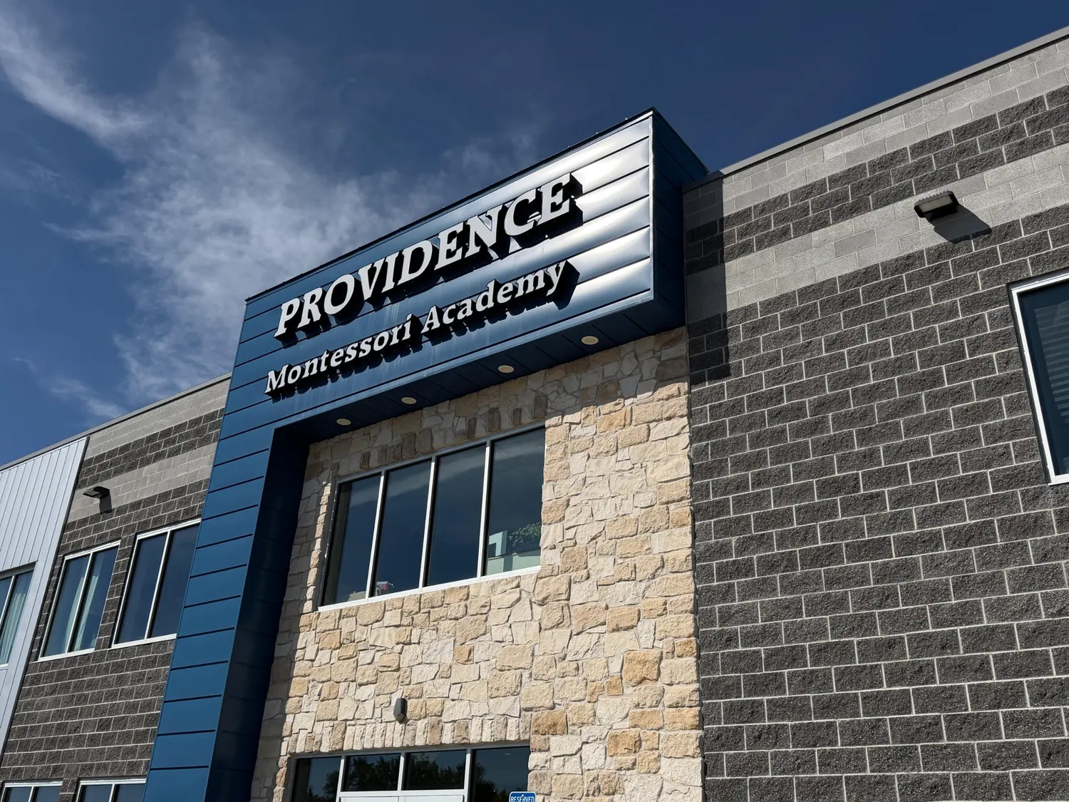 Providence exterior and school sign