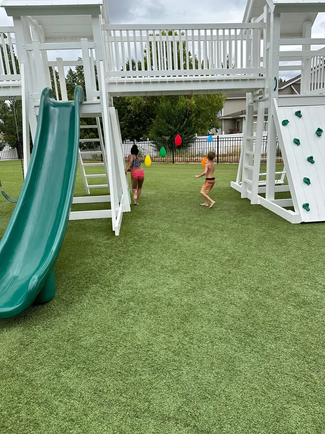 Children exploring the outdoor playground